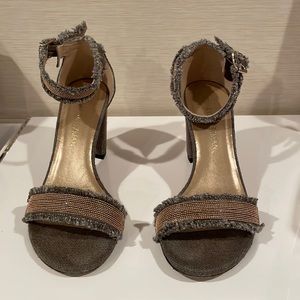 Stuart Weitzman Chaingang Frayed Ankle-Wrap Sandal. Black and gold size 6.5